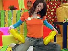 Innocent Brunette Teen Girl Playing With Her Wooden Shoes