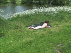 Nude Sunbather Takes A Leak On A Huge Open Field