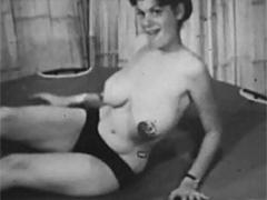 A Very Horny Vintage Stripper Wearing A Straw Hat Posing