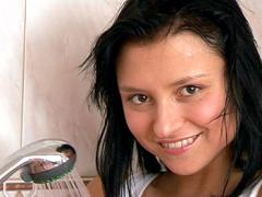 Cute Teenage Brunette Using Her Toy Under The Steamy Shower