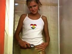 Teenage Blonde Loves To Rub Her Shaved Pussy Under Shower