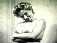 Big Breasted Fifties Chick Showing Her Big And Round Tits